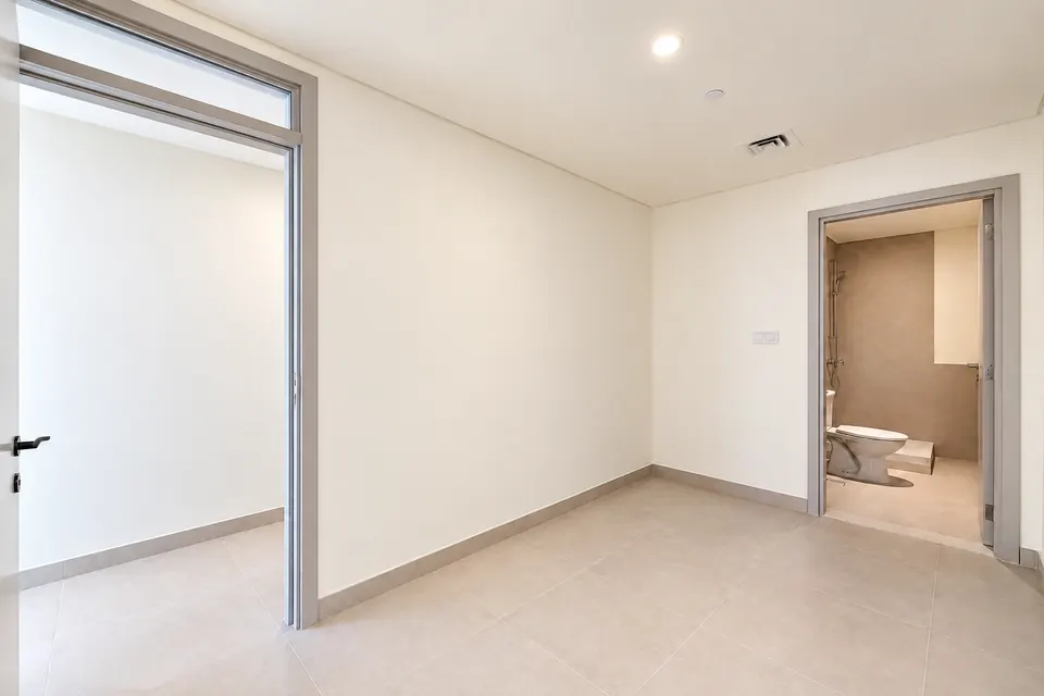 Bedroom and bathroom doorway at Beach Mansion after interior walls-and-ceilings painting