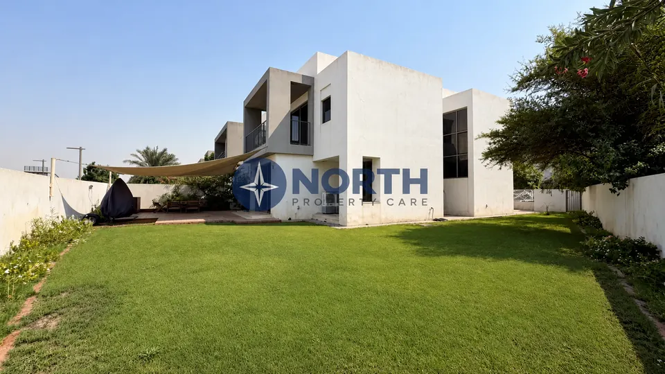 Rear exterior of the Sidra villa before the full repaint