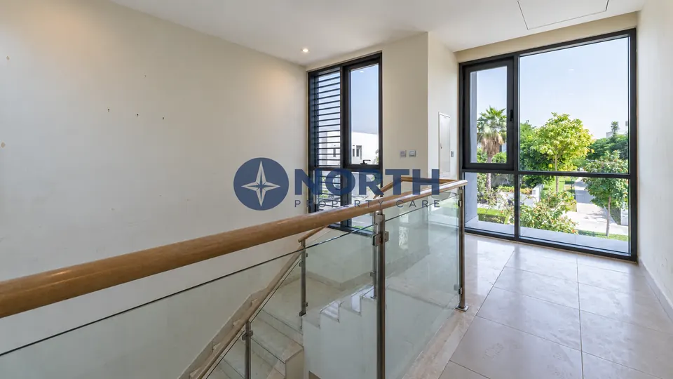 Upper stair landing before interior villa painting