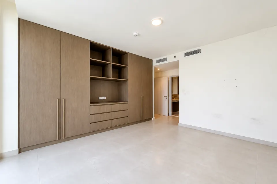 Bedroom and wardrobe at Beach Mansion before interior painting