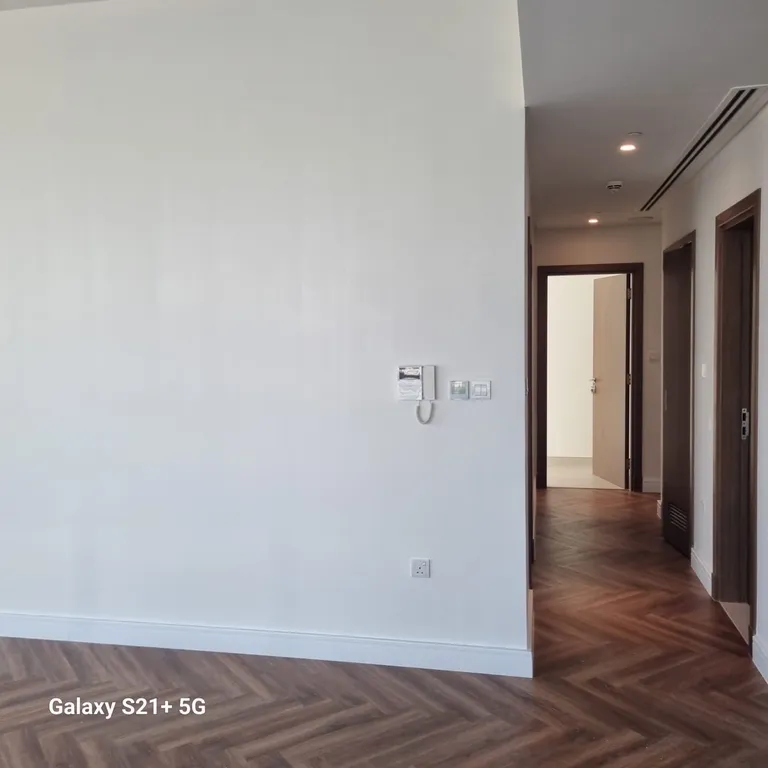 Wall repainted white after move-out painting at Canal Front Building, Business Bay