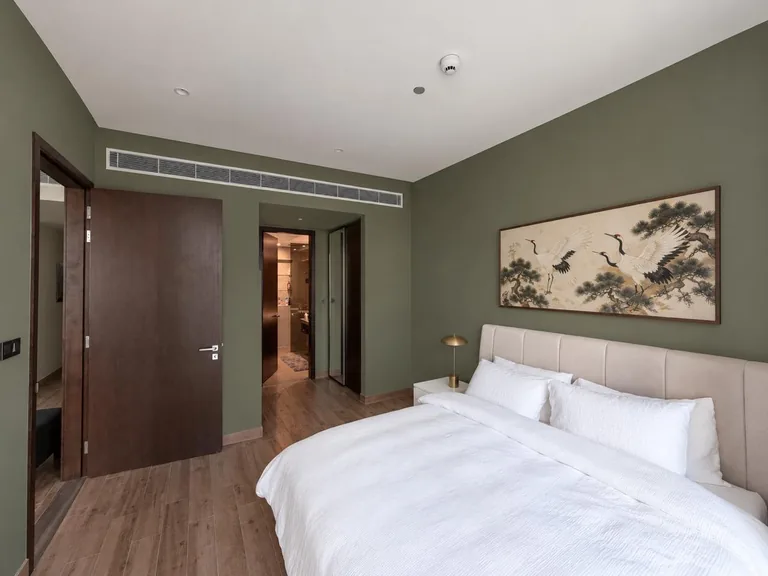 AI-generated inspiration image the client supplied showing a green bedroom look