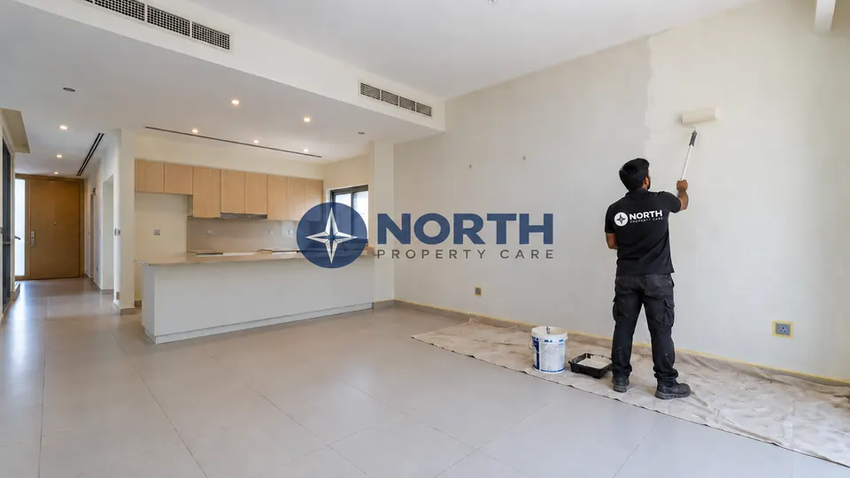 Open-plan ground floor of the villa during interior repainting