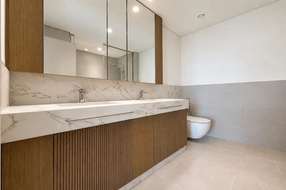 Bathroom wall at Beach Mansion before interior painting