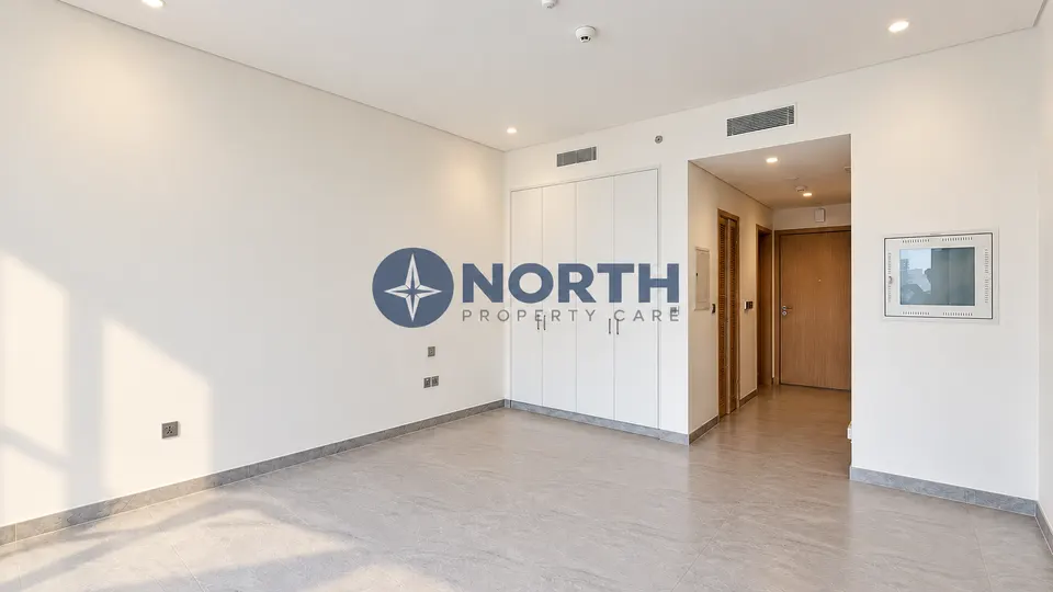 Main room, wardrobes and entrance after same-colour internal wall painting at Peninsula Four