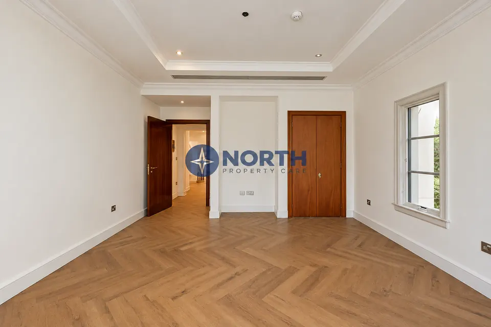 Same bedroom with clean walls after the refresh