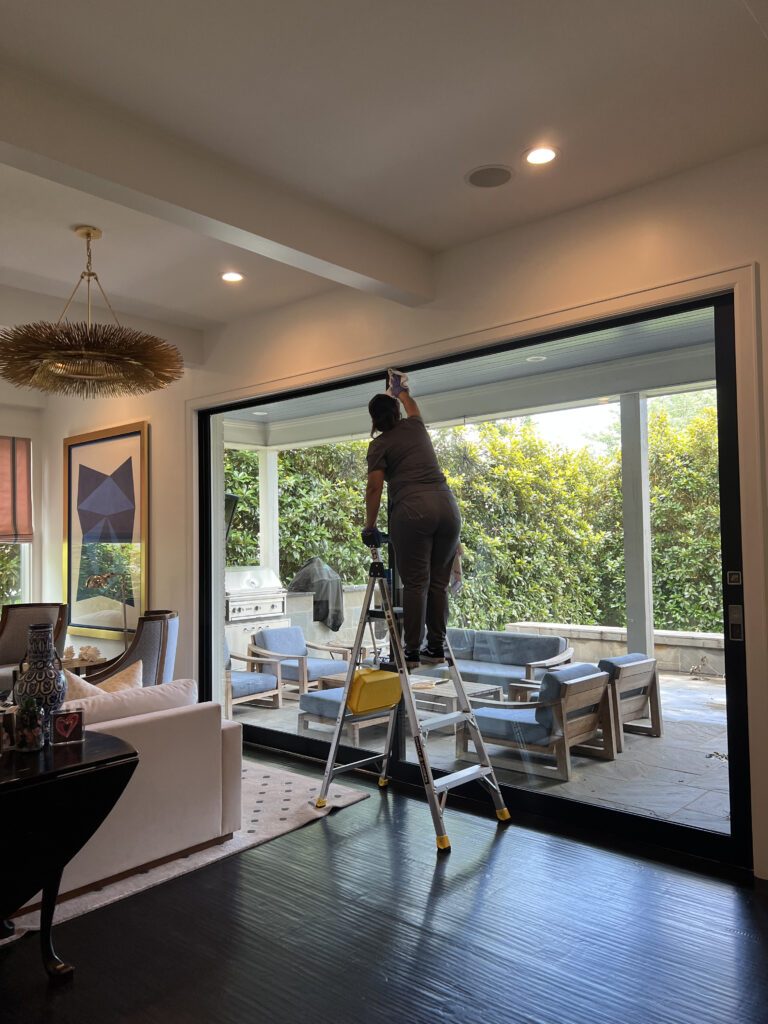 Interior glass and frame cleaning inside a Dubai villa